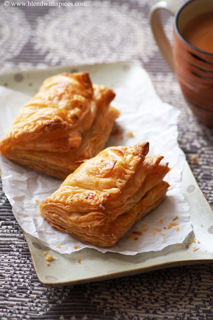 Golden flaky layers of Maruti Live Puff pastry plated and served with tea