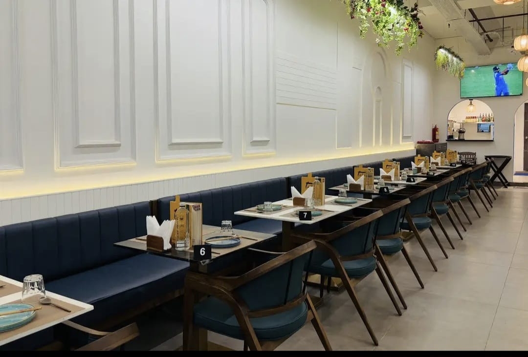 Thai Asian Food Restaurant, Ahmedabad — dining hall with booth seating