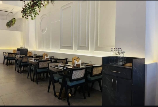 Thai Asian Food Restaurant, Ahmedabad — dining area with decorative wall panelling